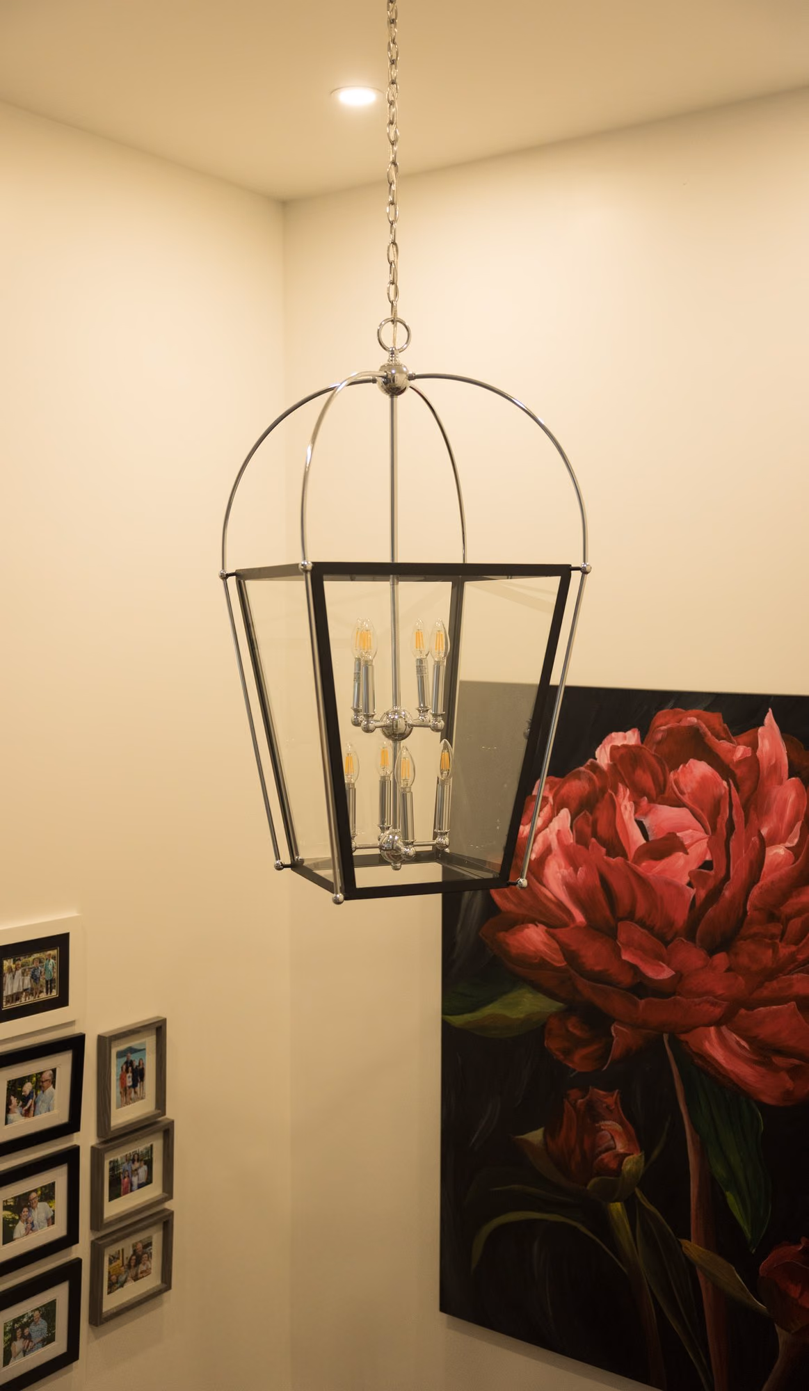 Lantern chandelier beside peony artwork